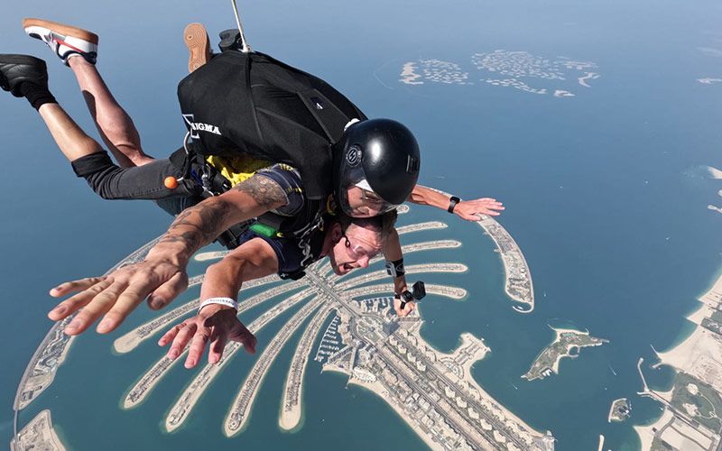 Chris Morrissey sky diving over Palm Island in Dubai